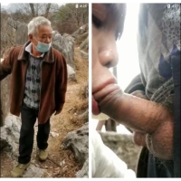 老头山顶峰操变装男射石头上